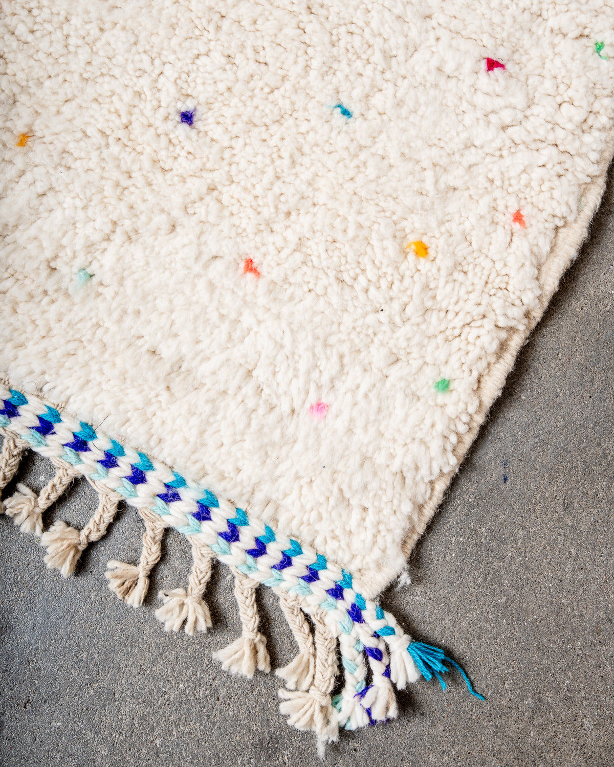 Modern, designer, handcrafted Berber rug from Morocco. Beniourain carpet with beautiful colours and patterns and fluffy wool texture.